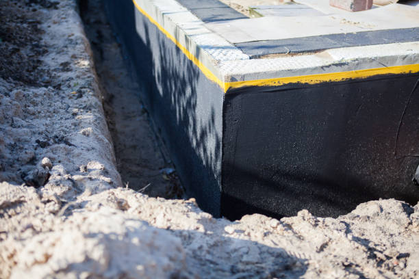 Professional Waterproofing technician working in Schaumburg, IL
